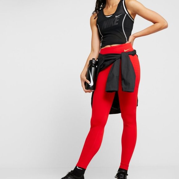 Nike Performance TECHKNIT EPIC LUX Leggings in red - Picture 1 of 4